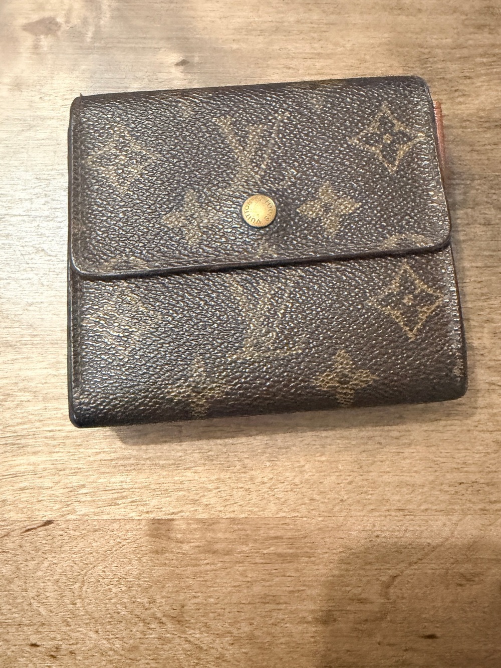 LOUIS VUITTON
Monogram Canvas Elise Wallet